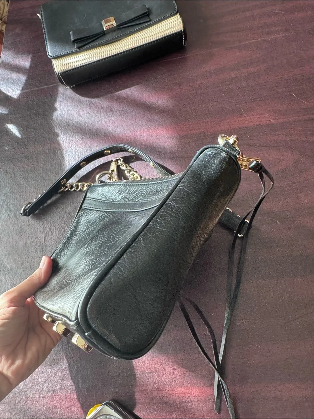 Rebecca Minkoff Mini M.A.C. crossbody bag featuring black Gold tone hardware
